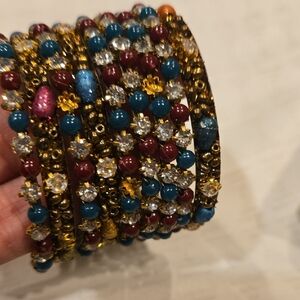 Charming Beaded Bangles with Gold and Blue Accents